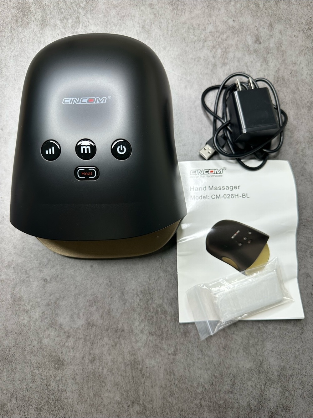 CINCOM Hand Massager - Black and Gold